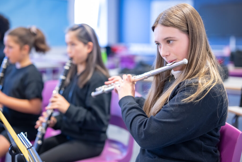Girl playing instruments, credit Nick Harrison