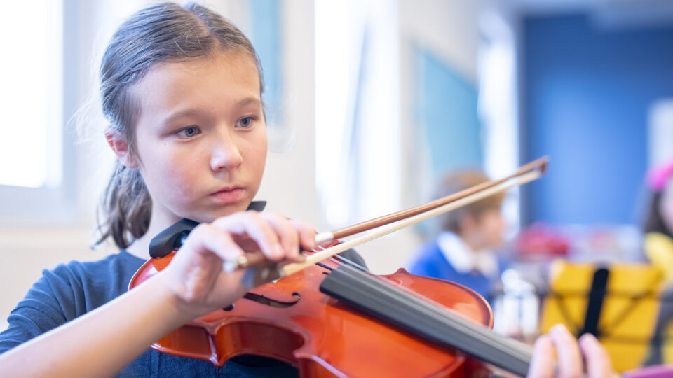Girl playing the violin, credit Nick Harrison