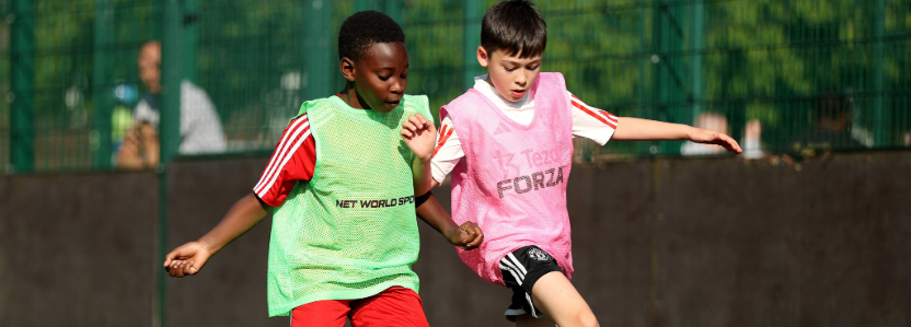 Boys playing football