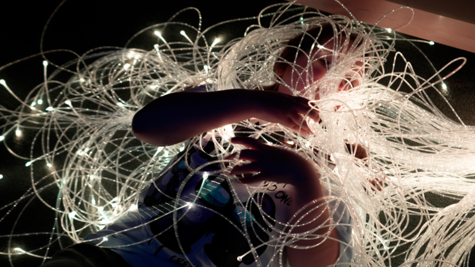Child with fibre-optic lights